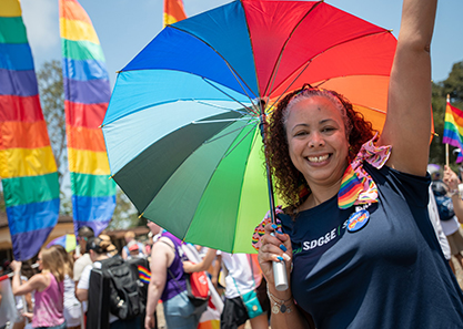 woman with multi-colored umbrella