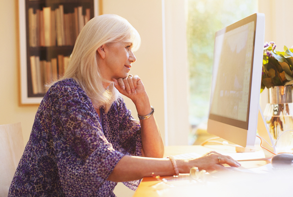 Woman looking at computer screen