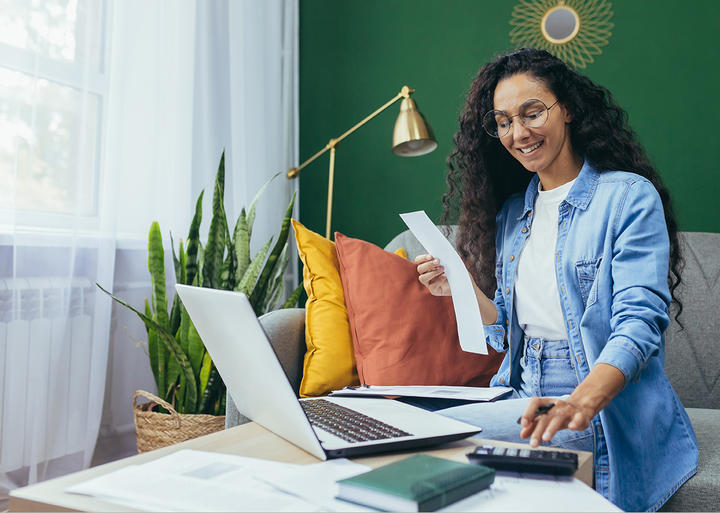 woman reviewing receipts