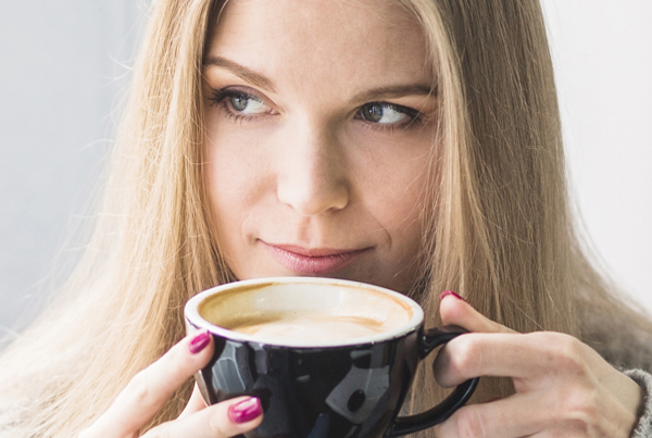 Woman sipping not beverage